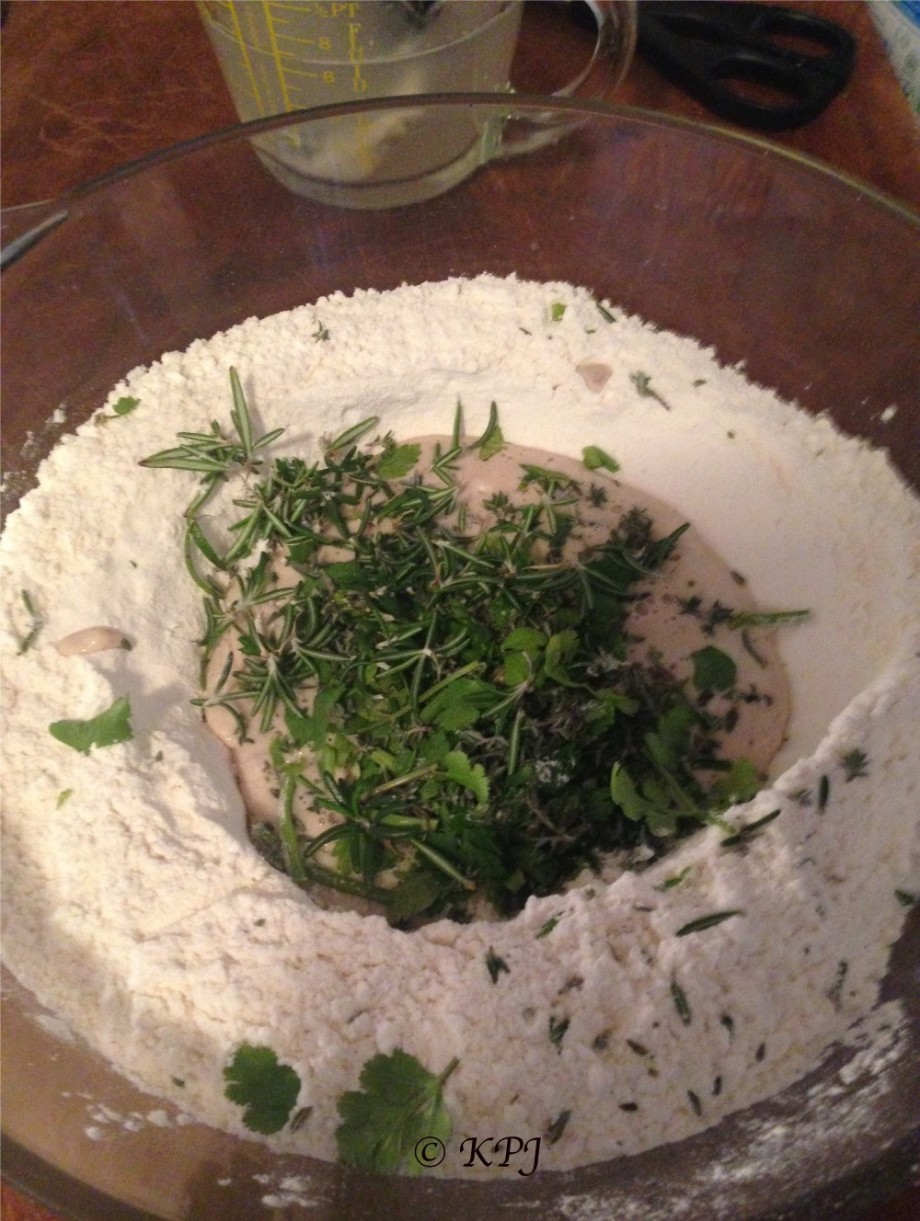 Fresh herbs added to yeast and flour